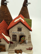 Front close-up showing the Bishops Oast sign, wreath door and barn doors