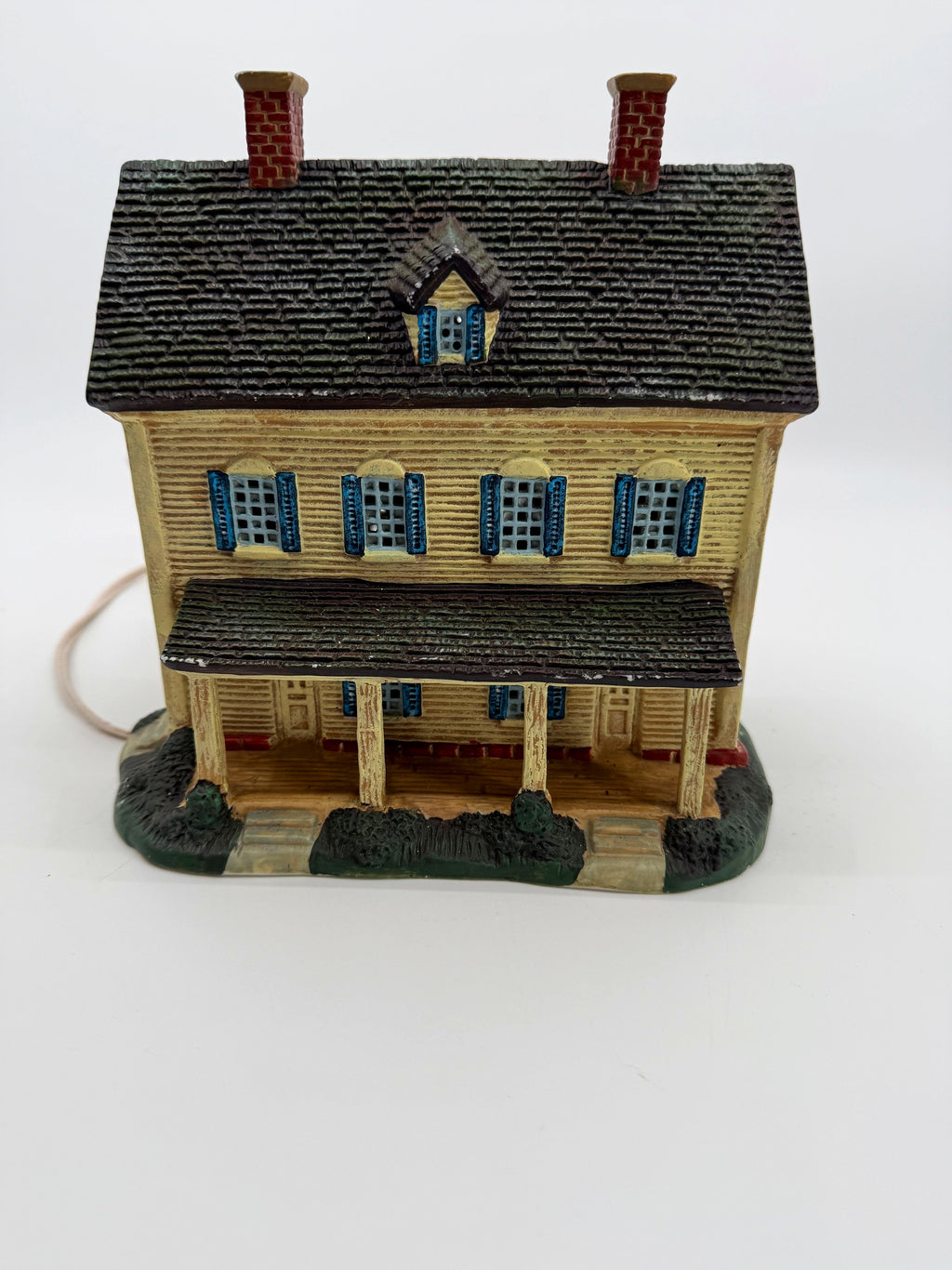 Lang & Wise Meadowbrook Farm House — front view with covered porch, blue shutters, and brick chimneys, 1996 First Edition
