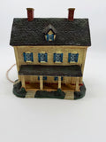 Lang & Wise Meadowbrook Farm House — front view with covered porch, blue shutters, and brick chimneys, 1996 First Edition