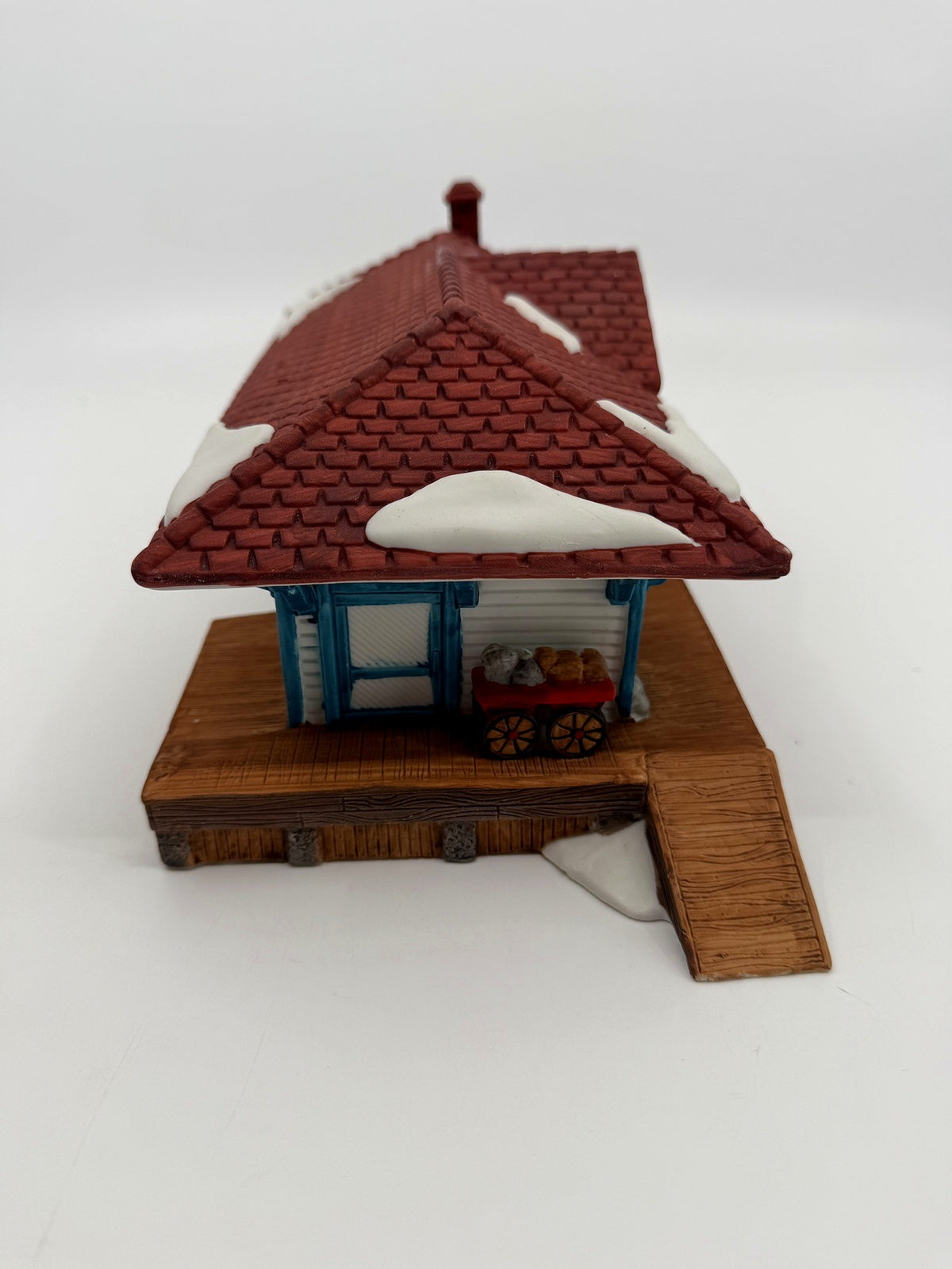 Department 56 New England Village Weston Train Station #5931-5 — end view with the luggage cart on the platform