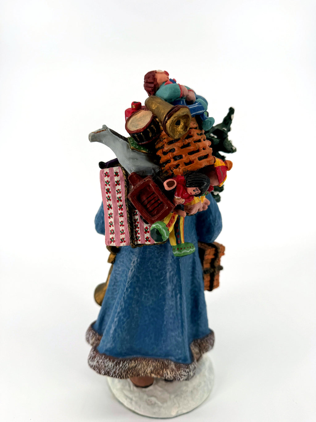 Back view of Winter Santa — full toy pack with rocking horse, dolls and the pink floral gift box