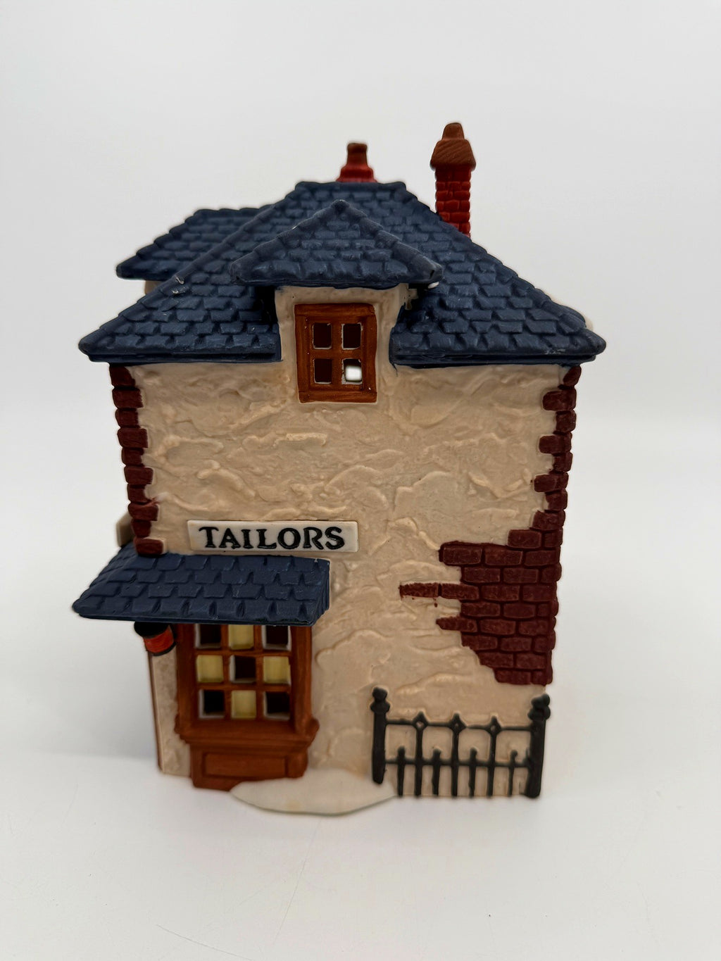 Department 56 Dickens' Village Walpole Tailors #5926-9 — side view with the TAILORS sign and iron fence