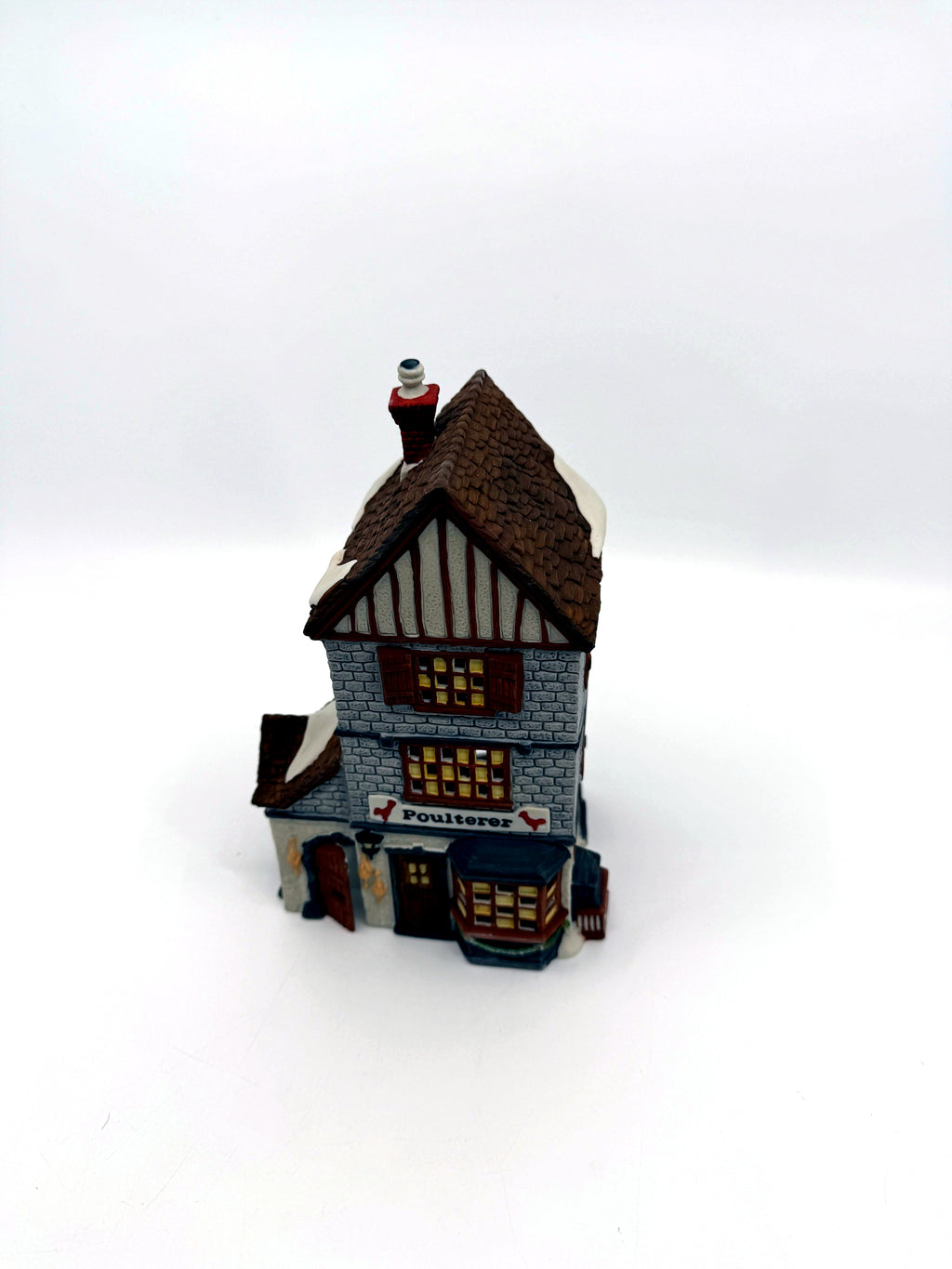 Department 56 Dickens' Village Poulterer 1988 lighted porcelain poultry shop — front three-quarter view, closer
