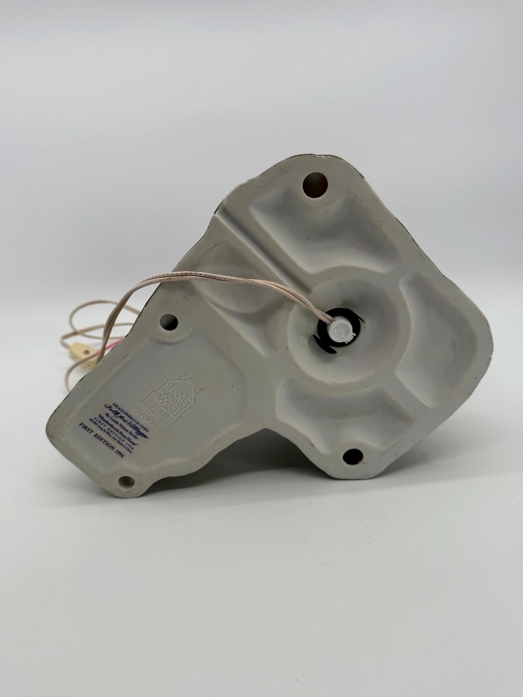 Underside showing the light socket and original electrical cord