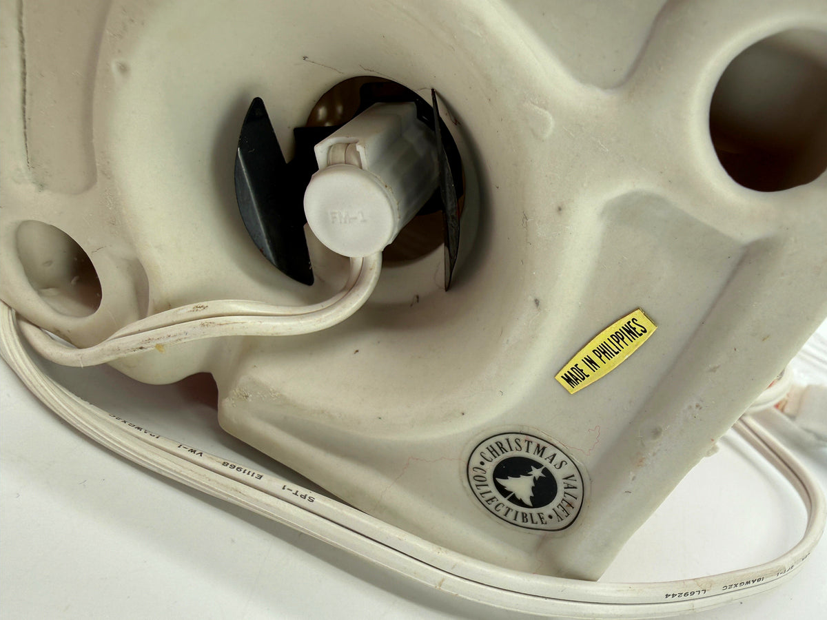 Underside with the light socket, Christmas Valley Collectible stamp and Made in Philippines sticker (enhanced photo)