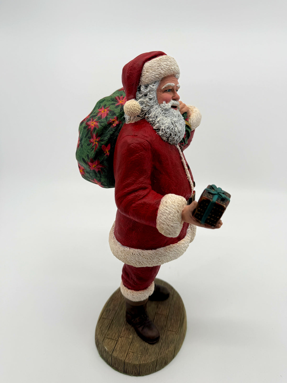 Vintage 1994 Duncan Royale Santa's Gift figurine – side profile view