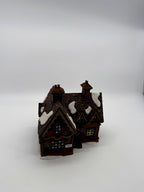 Front view from a distance showing the full cottage