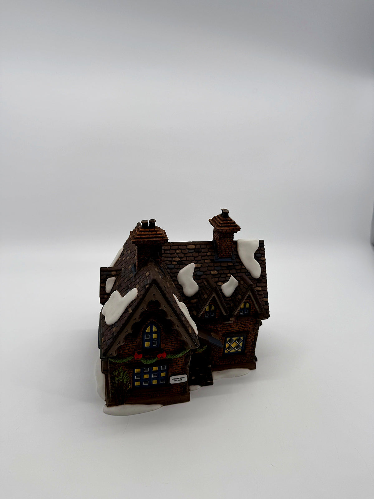 Front view from a distance showing the full cottage