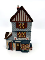 Department 56 Dickens' Village Poulterer 1988 lighted porcelain poultry shop — front close view: sign, bay window and hanging poultry