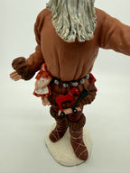Vintage 1983 Duncan Royale Pioneer Santa figurine – detail of the miniature toys at Santa's belt: doll, rocking horse and toy rifle