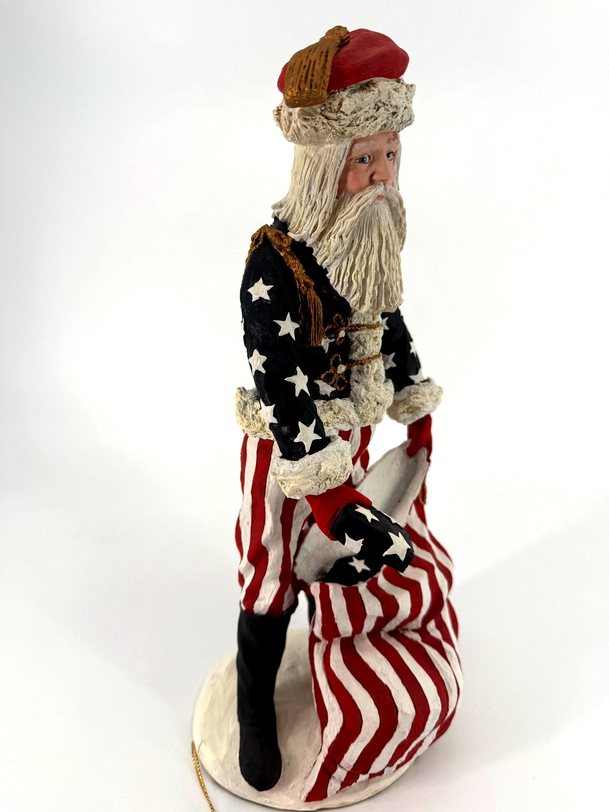 Duncan Royale Civil War Santa - right three-quarter view showing the gold epaulette, star coat, striped trousers and black boot