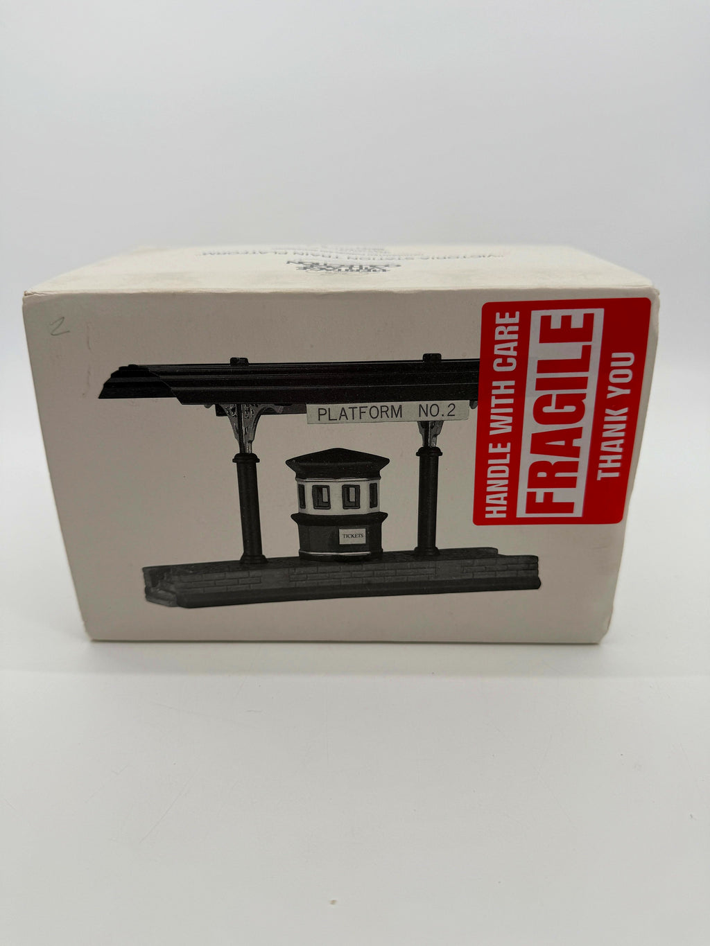 The original Department 56 box, front with platform illustration (enhanced photo)