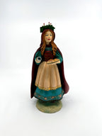 St. Lucia figurine — full front view on its round base