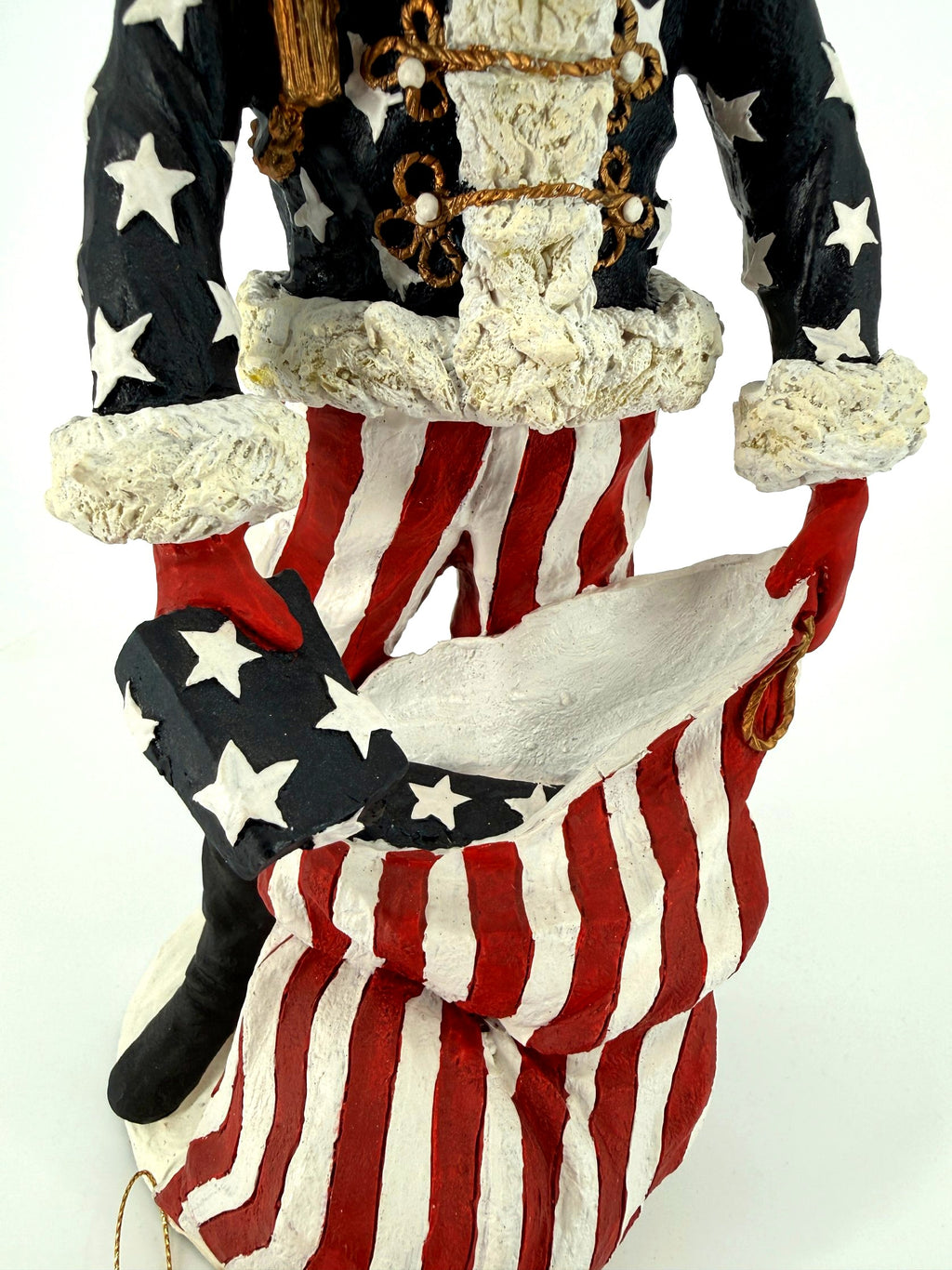 Duncan Royale Civil War Santa - detail of the gold frog closures, fur trim and the stars-and-stripes toy sack with a star-spangled gift