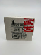 Department 56 Dickens' Village The Mermaid Fish Shoppe #5926-9 — original box front with the printed shop illustration and FRAGILE stickers