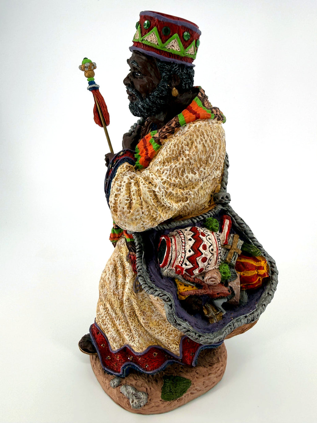 Left three-quarter view showing the gift sack with its patterned drum and gifts
