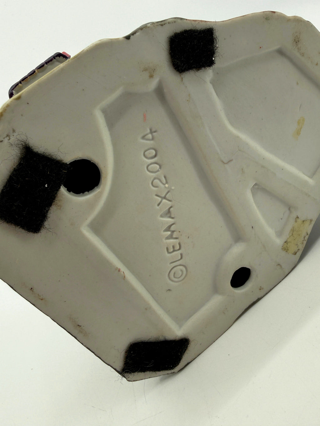 Underside of the base with the Lemax 2004 mark (enhanced photo)