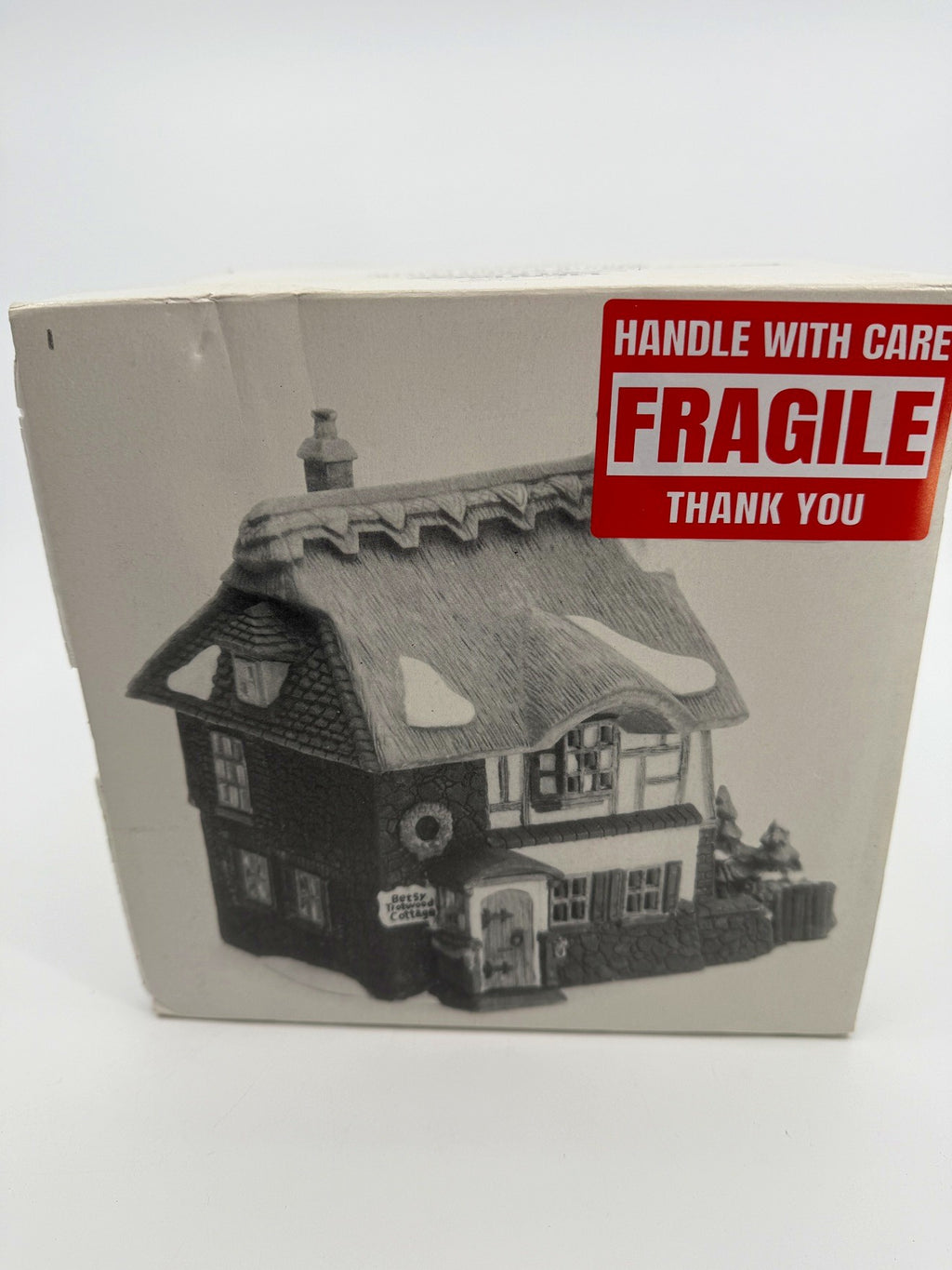 Department 56 Dickens' Village Betsy Trotwood's Cottage #5550-6, David Copperfield — original box front with the printed cottage illustration and FRAGILE sticker