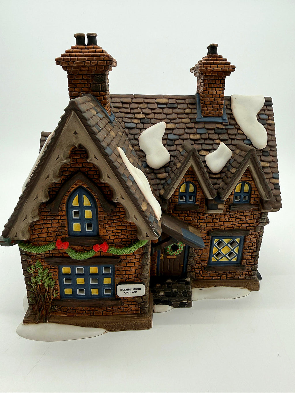 Front view with the original Heritage Village Collection booklet