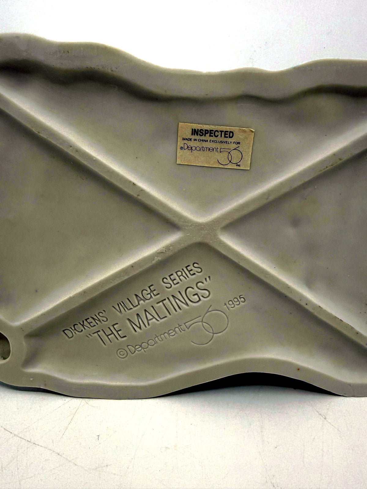 Underside of The Maltings showing the Dickens' Village stamp, 1995 date and Made in China sticker