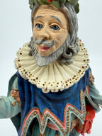 Vintage 1985 Duncan Royale Sir Christmas figurine – close-up of the face and ruff collar from a second angle, holly wreath in his silver-gray hair