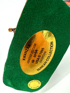 Underside of the male figure’s base — gold plaque: KWANZAA, Limited Edition No. 0999, USA © 1995, Valentine, Duncan Collection; Made in the Philippines
