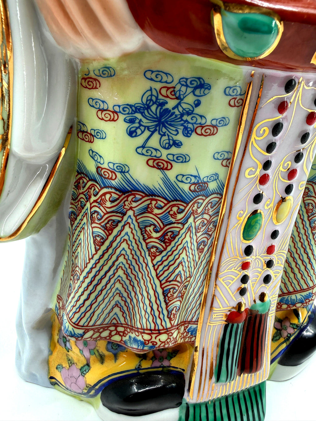 Vintage Chinese porcelain Lu Xing prosperity god statue, Taiwan — detail: robe hem mountain-and-wave pattern