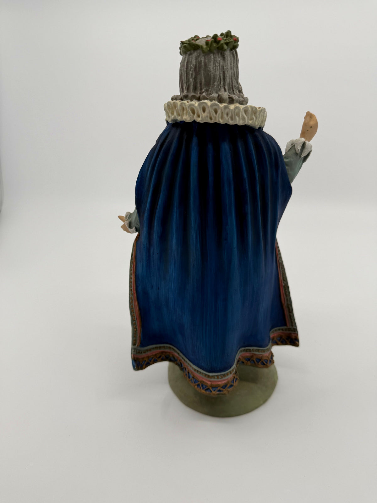 Vintage 1985 Duncan Royale Sir Christmas figurine – back view without the staff: royal blue cape and white lace ruff from behind