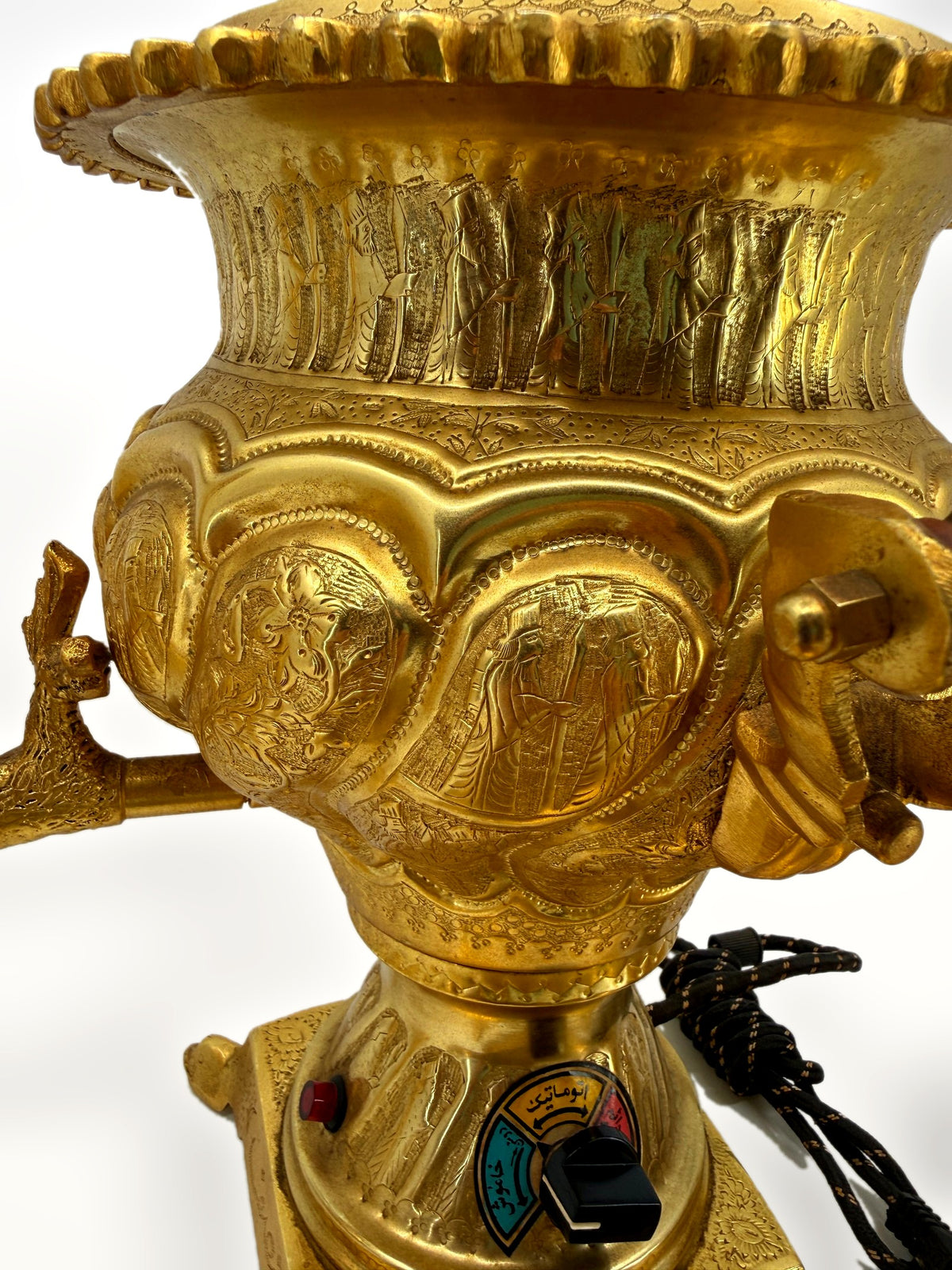 Samovar body close-up – procession band, medallions and control dial with Persian script