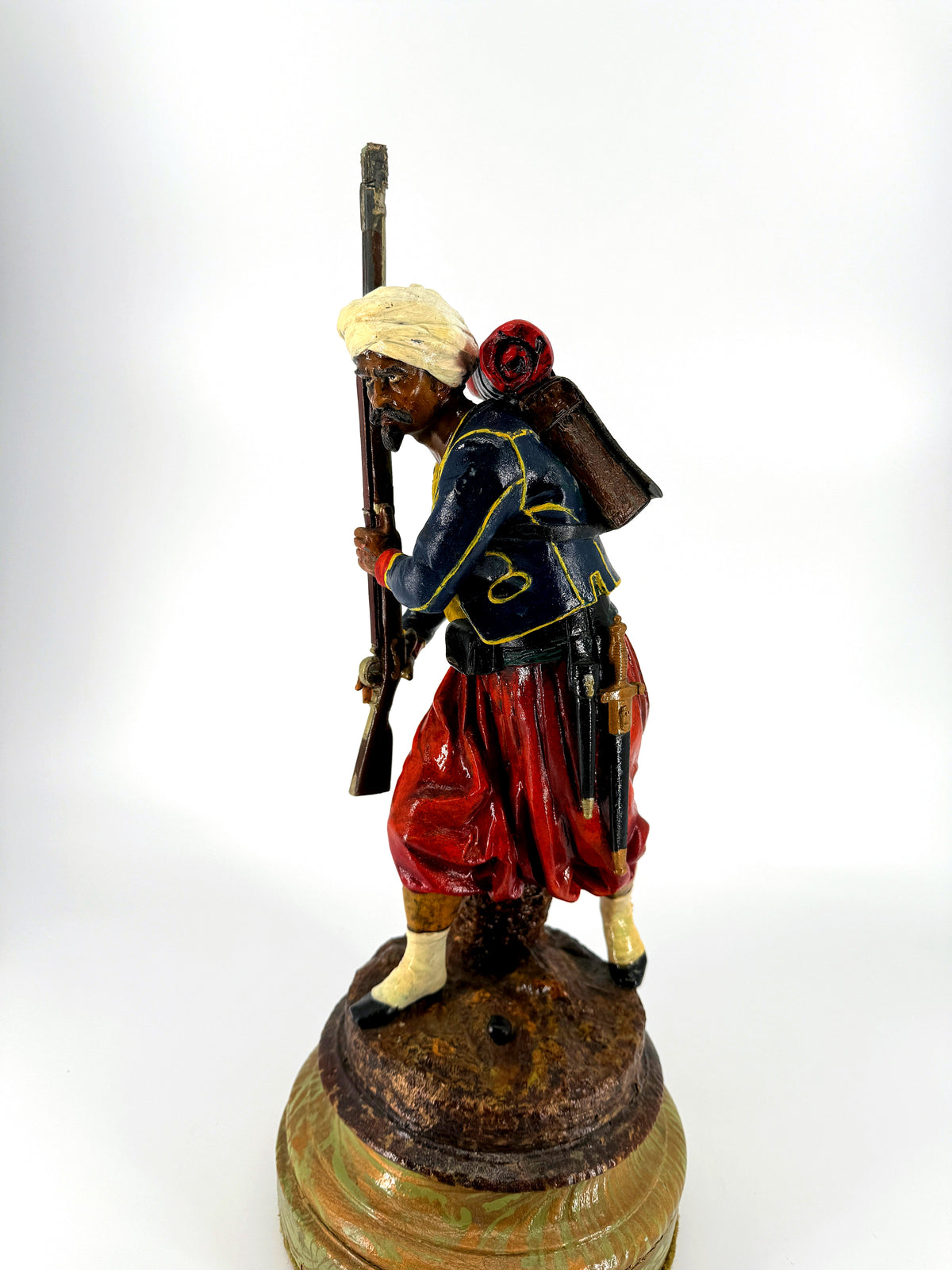 Mid-19th century polychrome zinc Zouave figure attributed to Cornelius and Baker — front three-quarter view