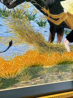 Signed Vietnamese hand-embroidered textile art — water buffalo in rice terraces — detail of the centre — hay, reeds and the farmer's legs in the water