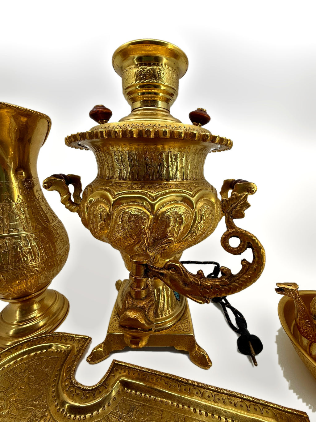Samovar front close-up – dragon-head spigot and paw feet
