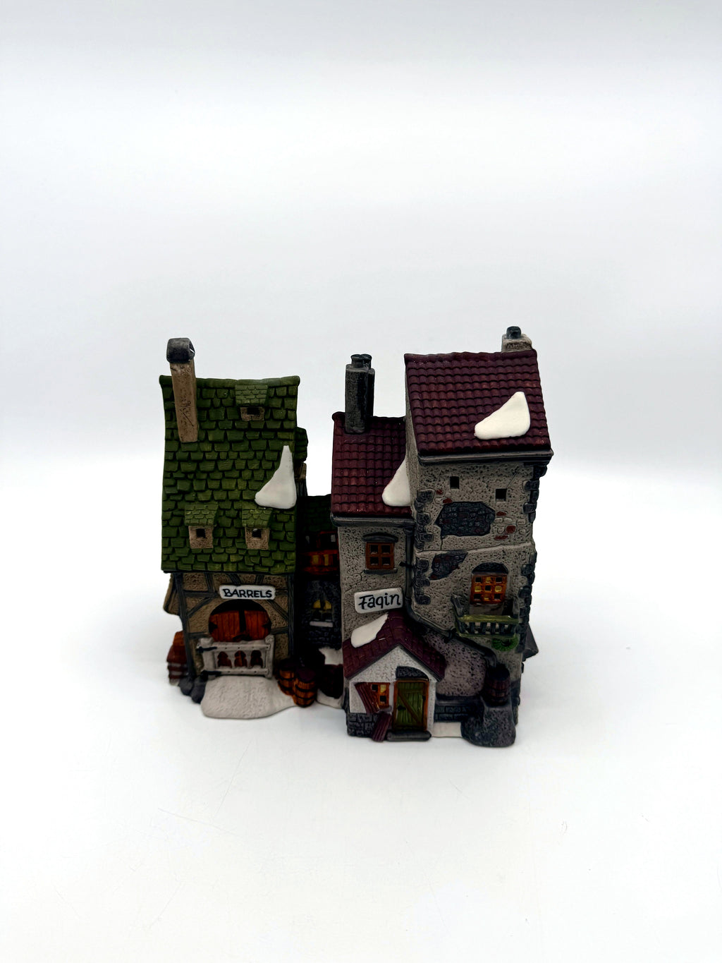 Front view: the green-shingled Barrels cooperage joined to the stone Fagin building