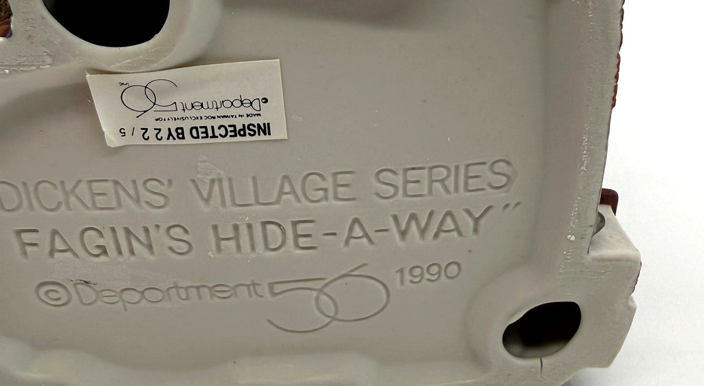 Close-up of the molded underside mark and the Made in Taiwan ROC inspection sticker