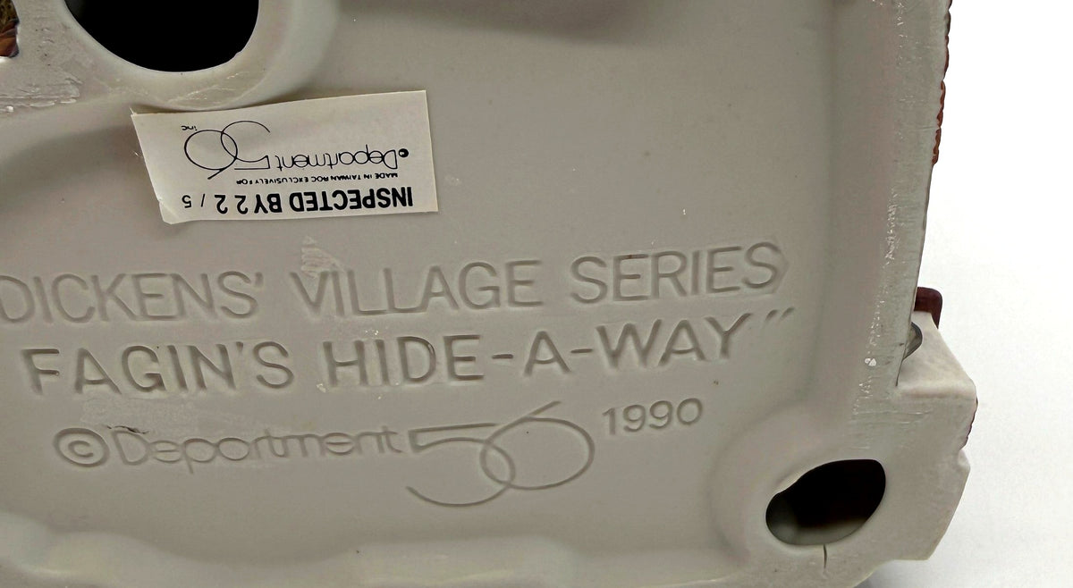 Close-up of the molded underside mark and the Made in Taiwan ROC inspection sticker