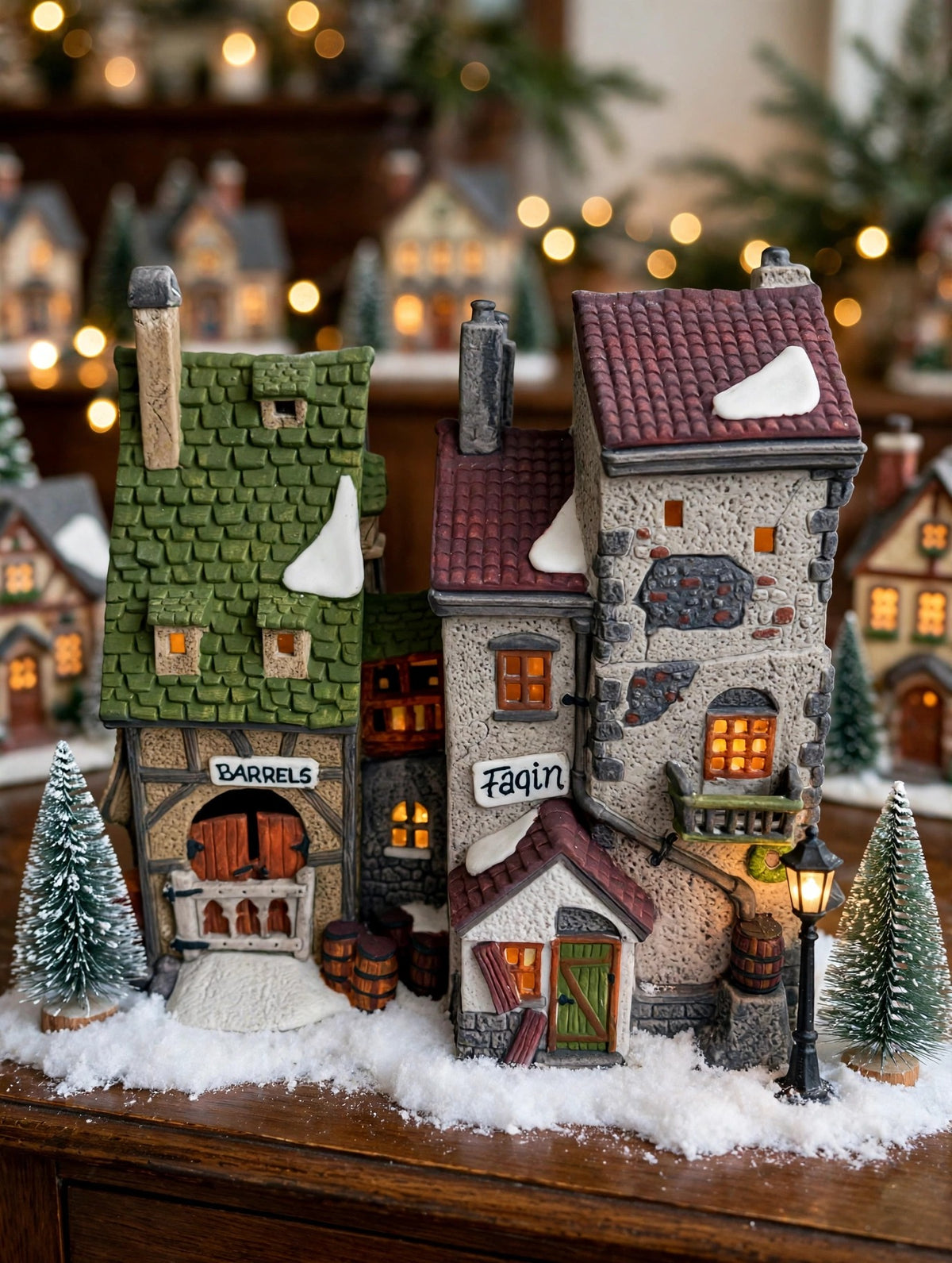 Styled lifestyle photo — Fagin's Hide-A-Way in a tabletop Christmas village display with bottle-brush trees and a lamppost (display inspiration)