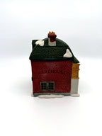 Department 56 M. Fezziwig Warehouse, Dickens' Village, 1986 – side view with WAREHOUSE molded in the brickwork
