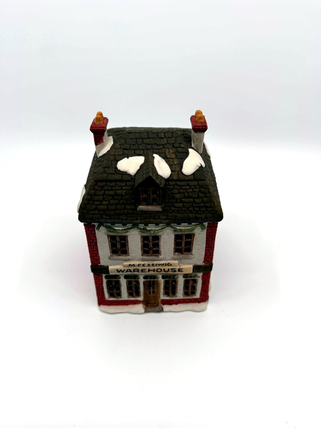Department 56 M. Fezziwig Warehouse, Dickens' Village, 1986 – front view from above showing the slate roof and chimneys