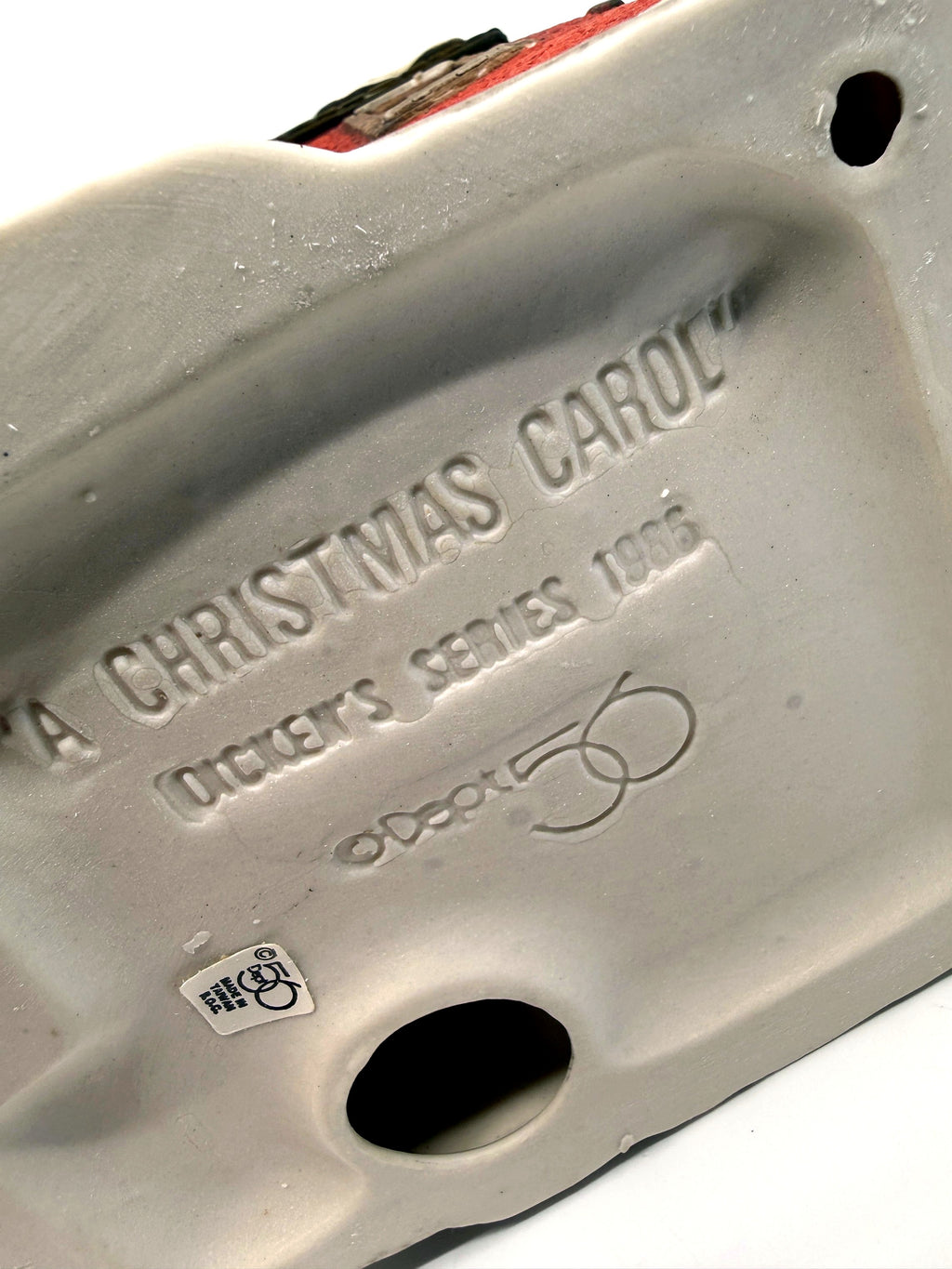 Department 56 M. Fezziwig Warehouse, Dickens' Village, 1986 – underside: molded A Christmas Carol Dickens' Series 1986 stamp and Made in Taiwan R.O.C. sticker