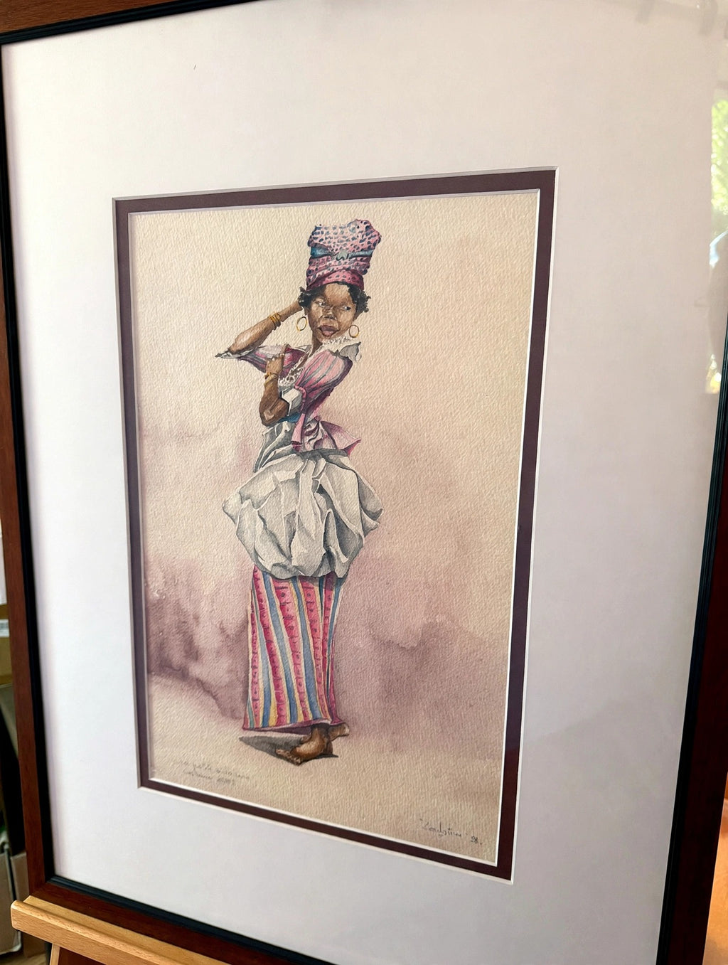 La petite mulatresse framed - angled view on easel (enhanced photo)