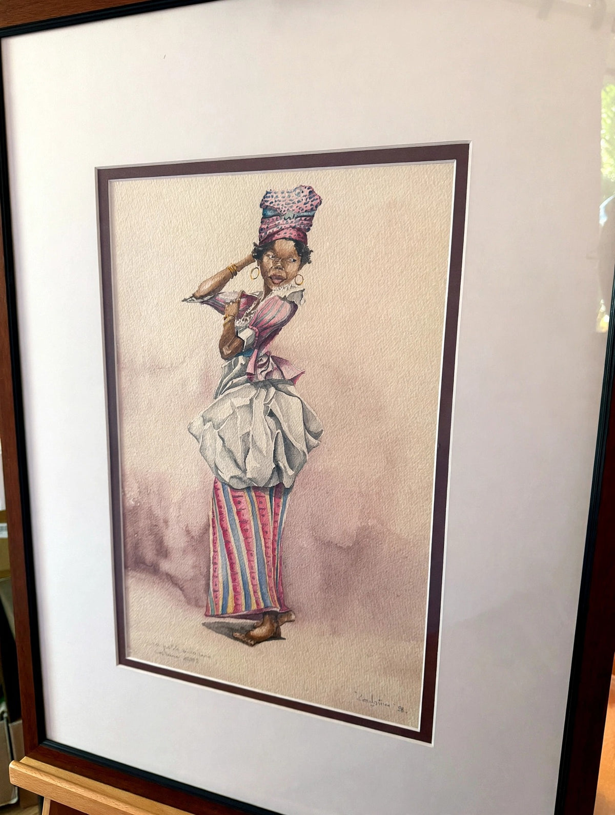 La petite mulatresse framed - angled view on easel (enhanced photo)