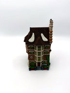 Department 56 Nephew Fred's Flat, Dickens' Village, 1991 – front view from above showing snow patches on the shingle roof