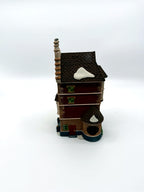 Department 56 Nephew Fred's Flat, Dickens' Village, 1991 – back view showing the light cord opening