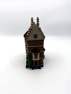 Department 56 Nephew Fred's Flat, Dickens' Village, 1991 – right side with tall stepped chimney