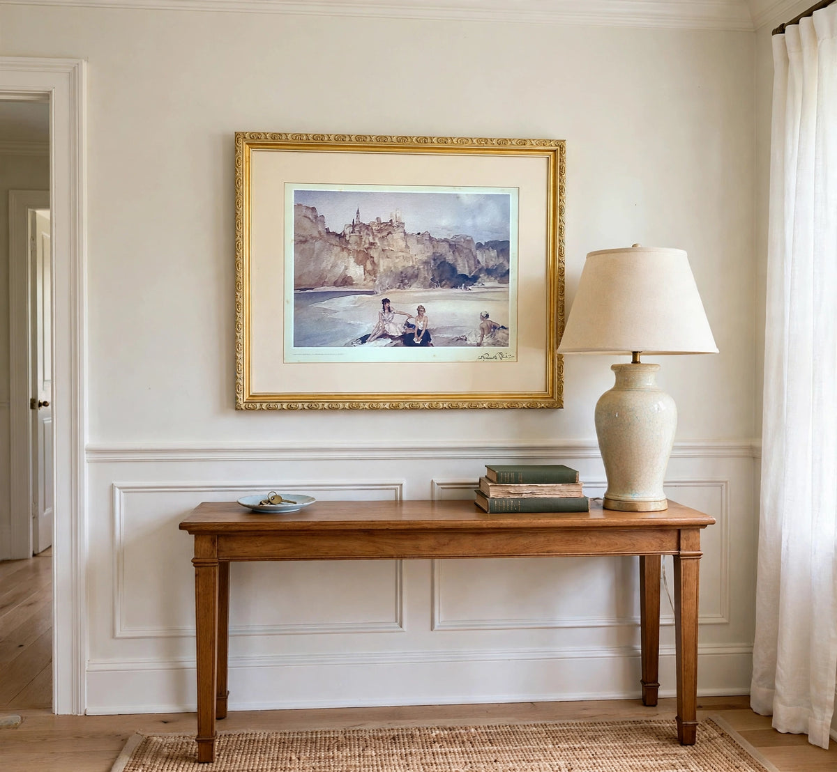 Styled lifestyle photo — the framed Flint print (24.5 × 20.5 in) above an entryway console with a tall lamp (display inspiration)