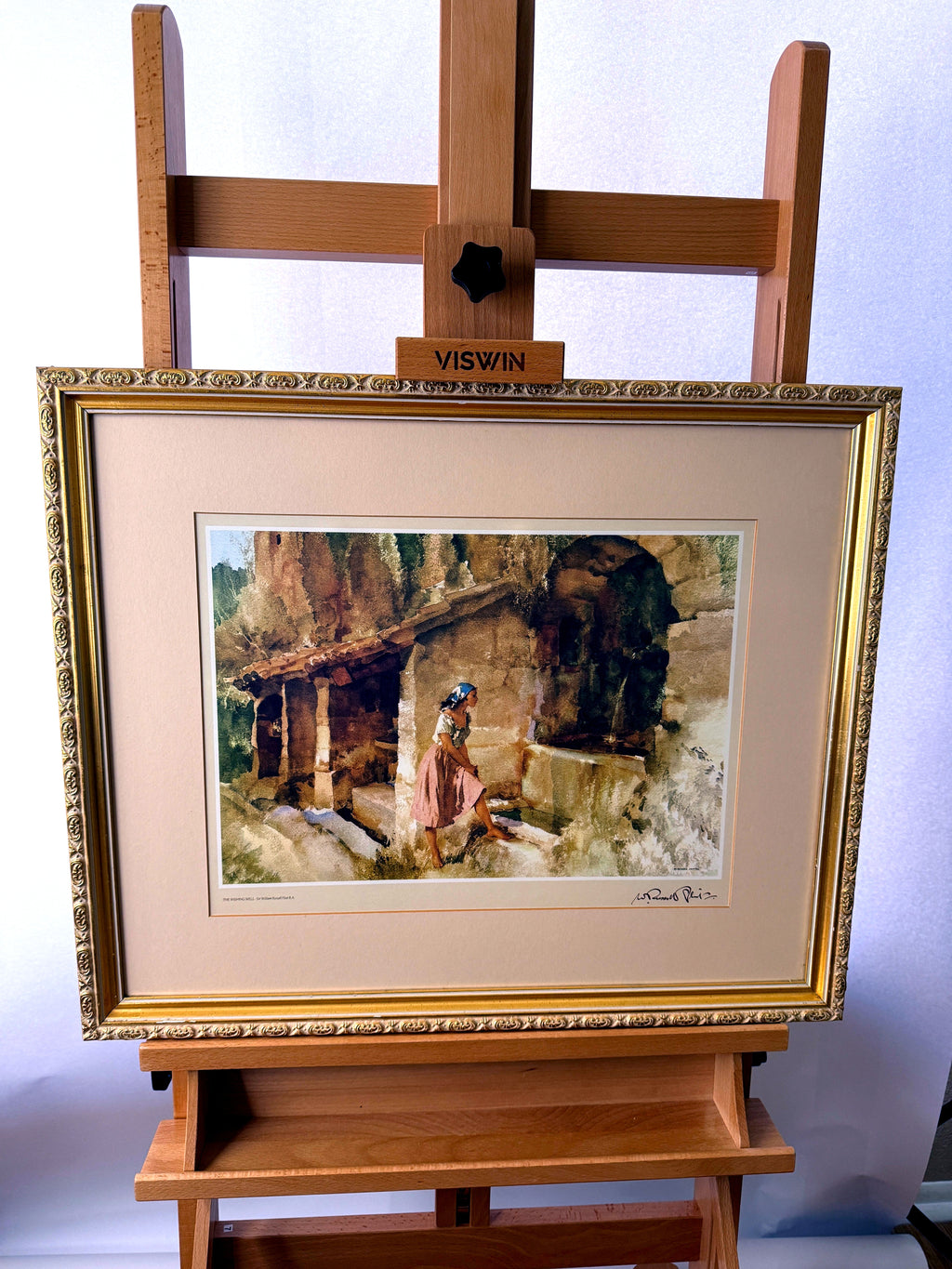 Sir William Russell Flint The Wishing Well framed art print — front view on an easel, closer