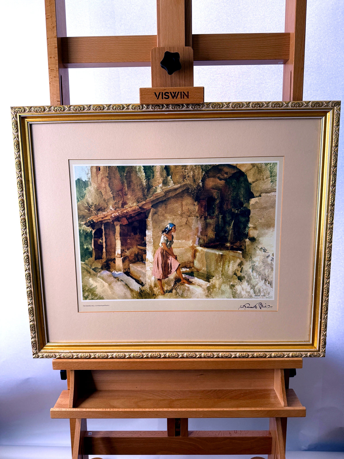 Sir William Russell Flint The Wishing Well framed art print — front view on an easel