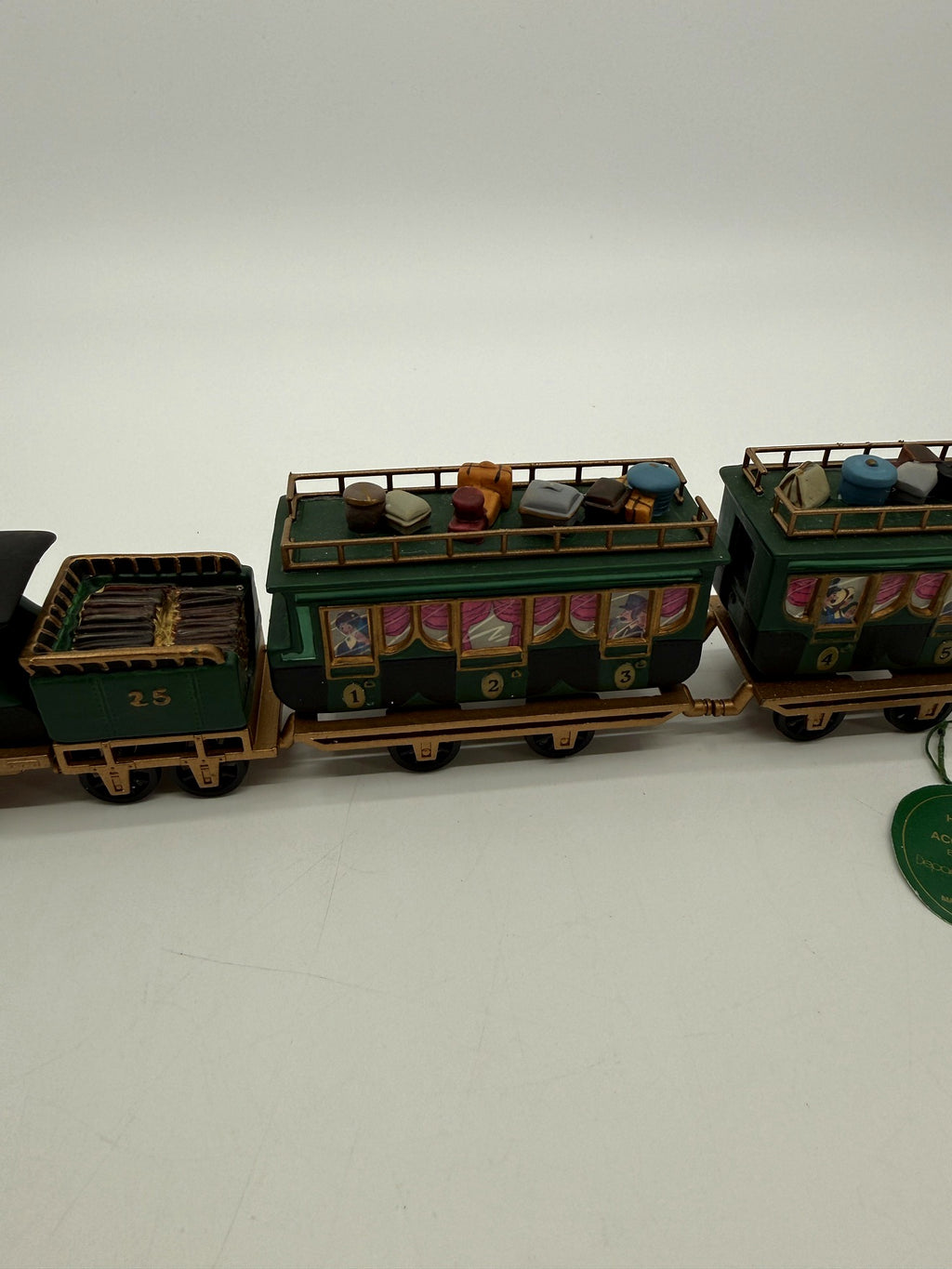 Department 56 Dickens' Village The Flying Scot Train, set of 4 - tender and the first passenger coach marked 1-2-3, showing the painted passengers and roof-rack luggage