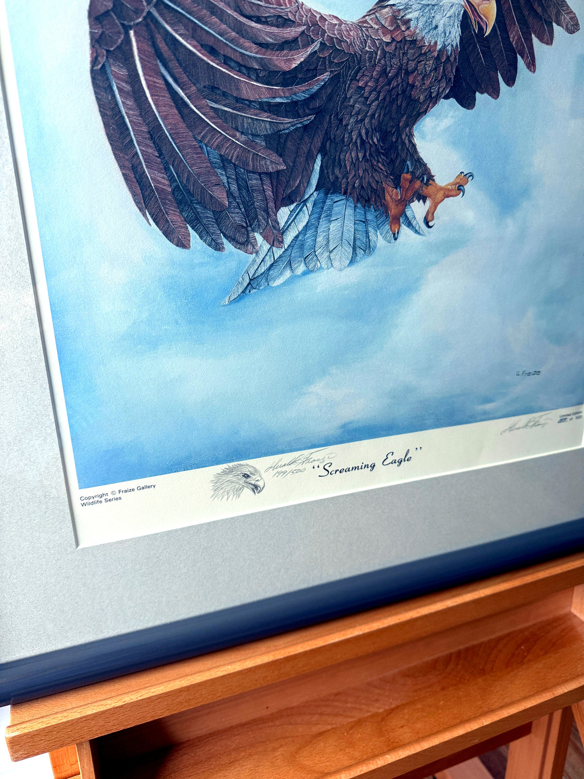 Gerald Fraize Screaming Eagle signed and numbered print, 199 of 500 — close-up of the eagle's wings and talons with the margin title
