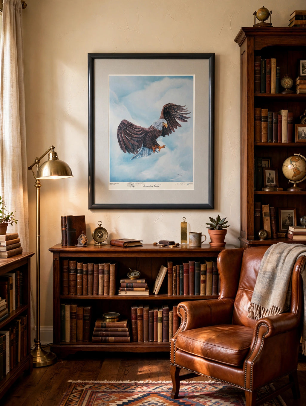 Styled lifestyle photo — the framed Screaming Eagle print in a vintage study with bookcases and a leather reading chair (display inspiration)
